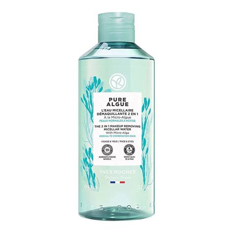 Una bottiglia di acqua micellare Yves Rocher con fiori