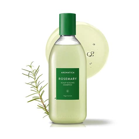 Immagine di un flacone di Aromatica Rosemary Scalp Scaling Shampoo con rosmarino fresco