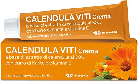Applicazione di crema alla calendula su una scottatura solare