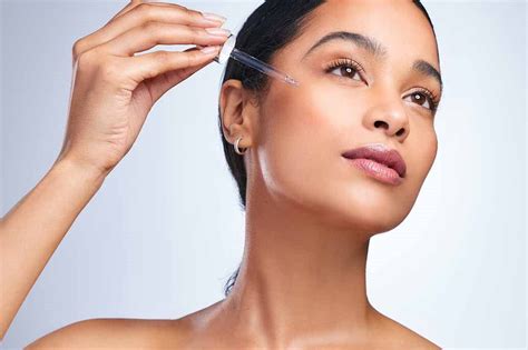 Schema che illustra l'azione degli acidi AHA sulla pelle